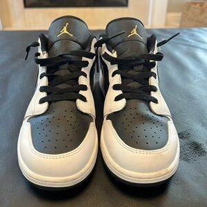 Youth size 7 Jordan lows . Black and white with gold . EUC